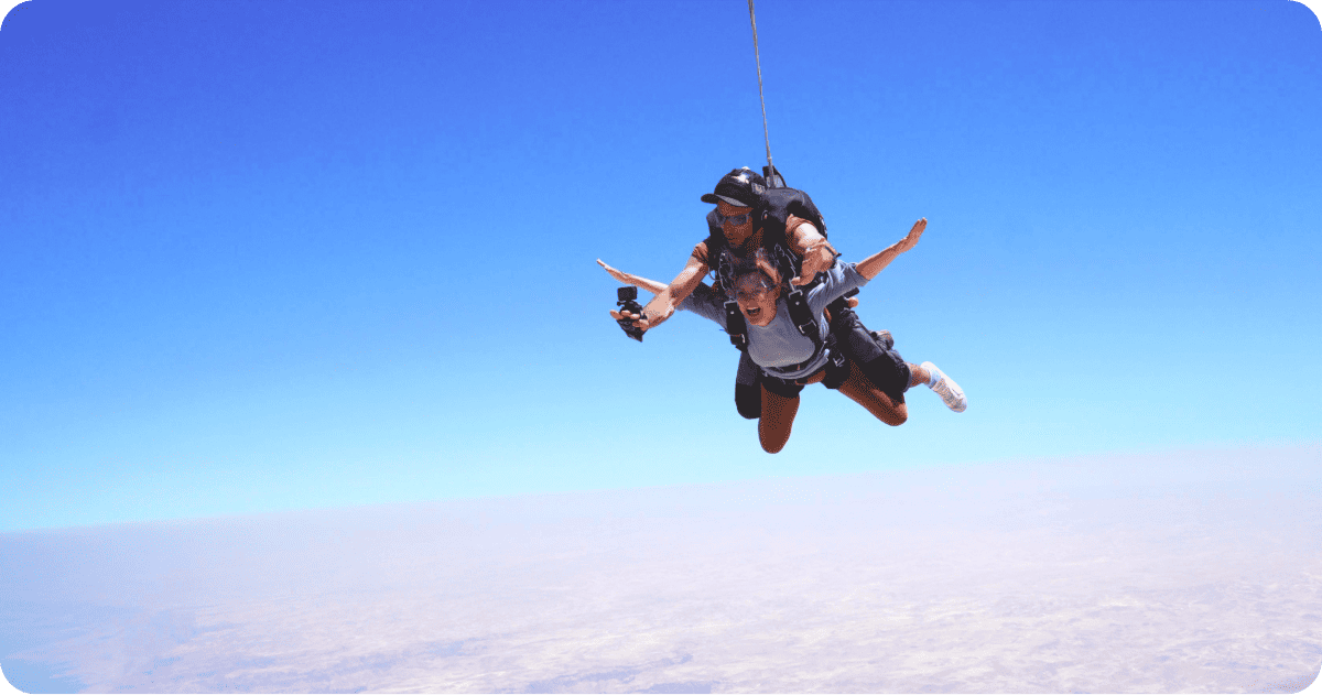 Woman and a man skydiving