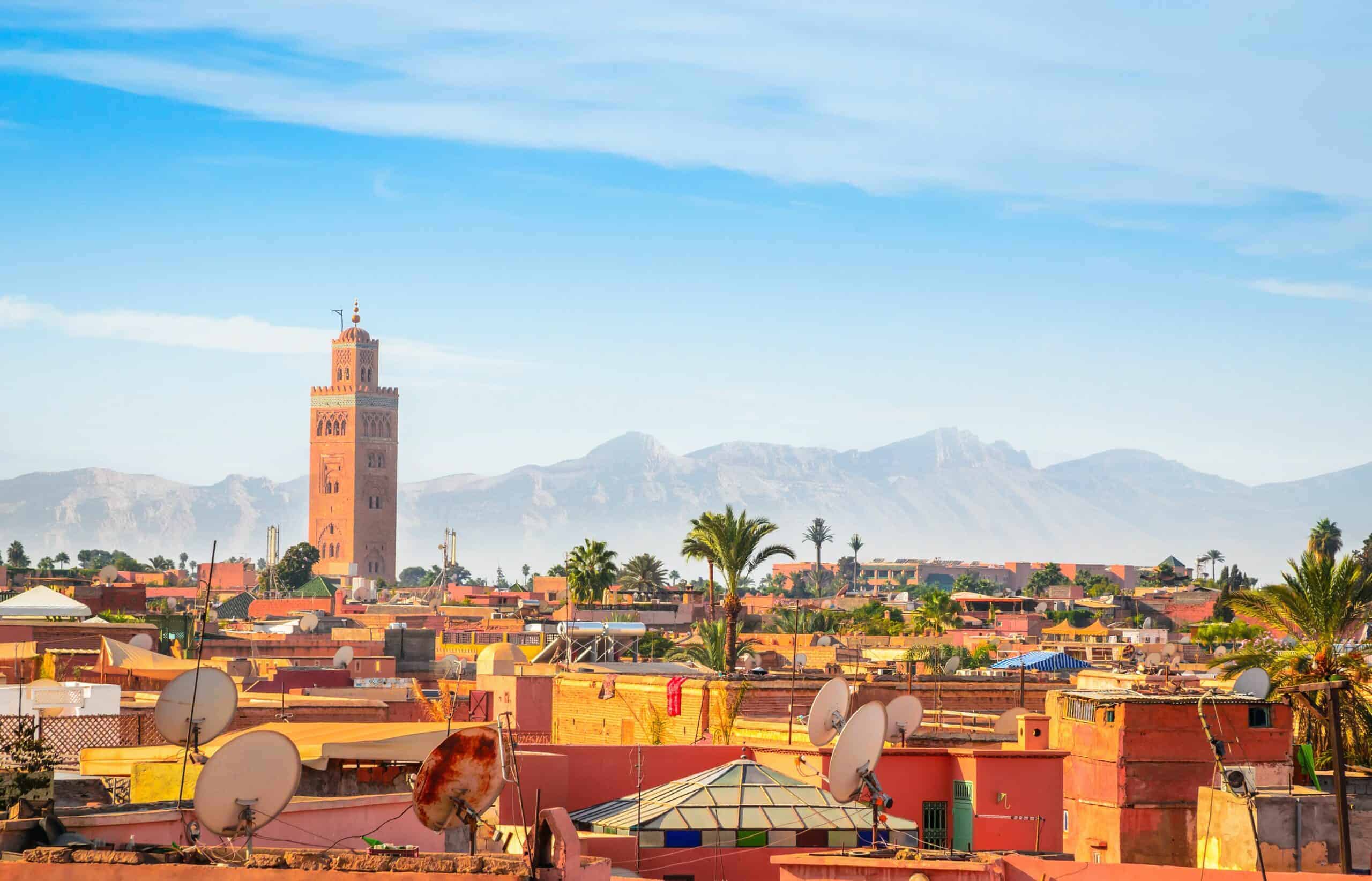 Landscape view of Marrakech, Morocco with mountains in the background.