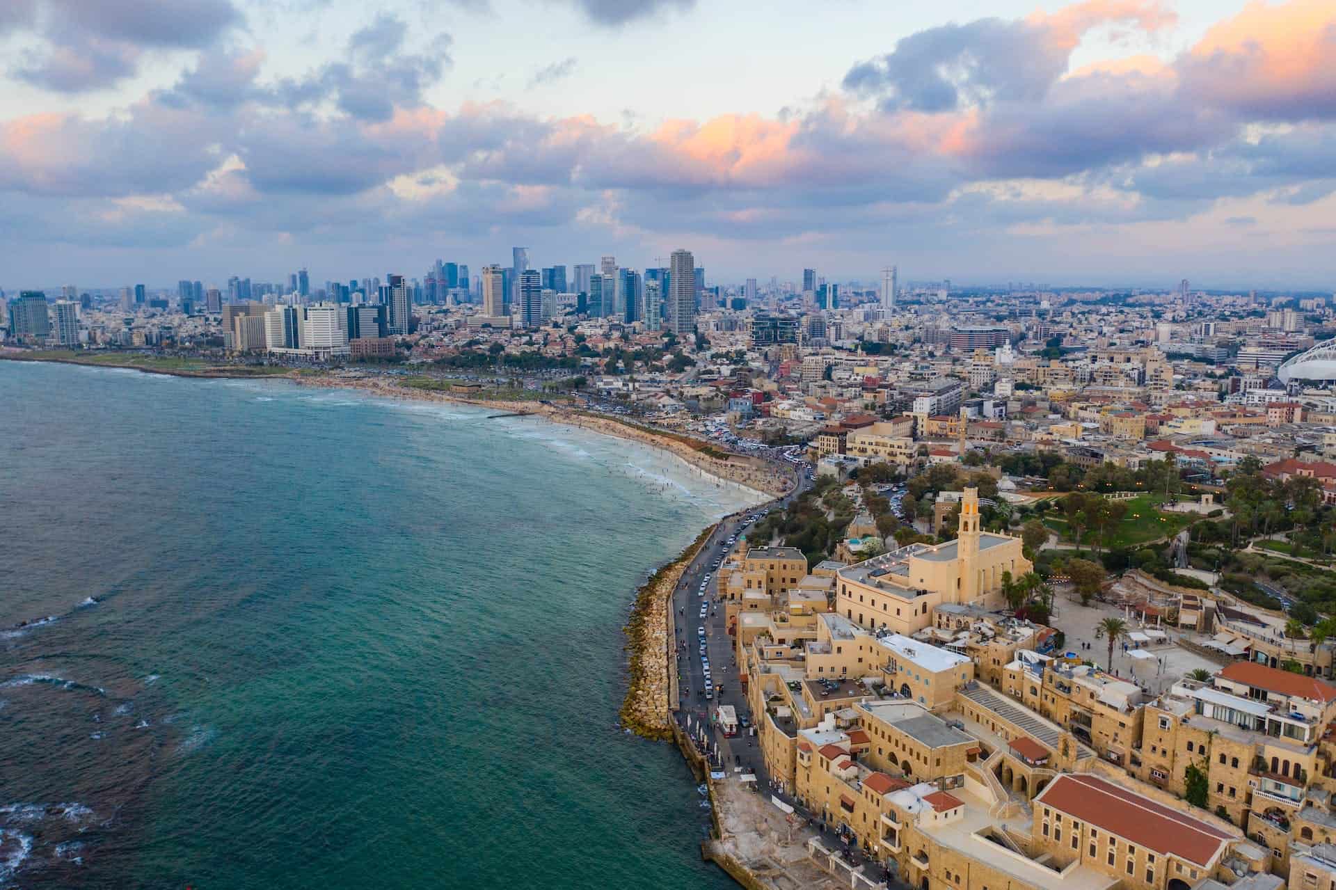 View of the Tel Aviv skyline with the ocean in the front. 