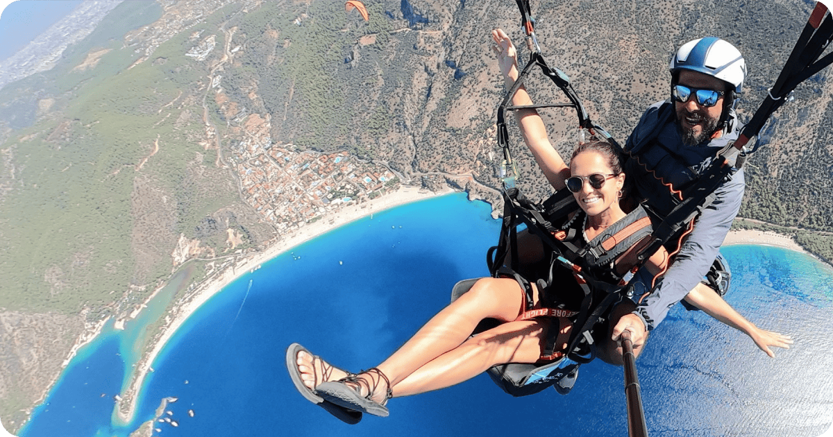 Alexa McDonald paragliding with a guide