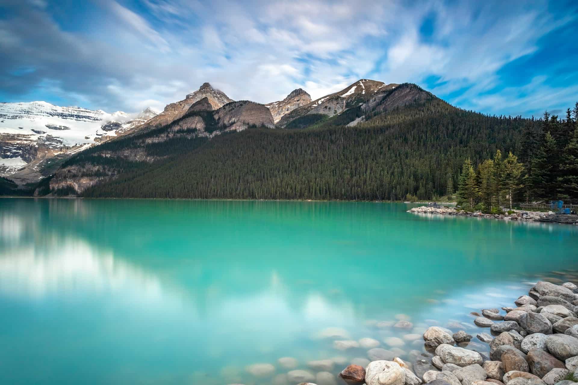 Lake Louise blue, blue waters with mountains in the background in Banff National Park, Canada