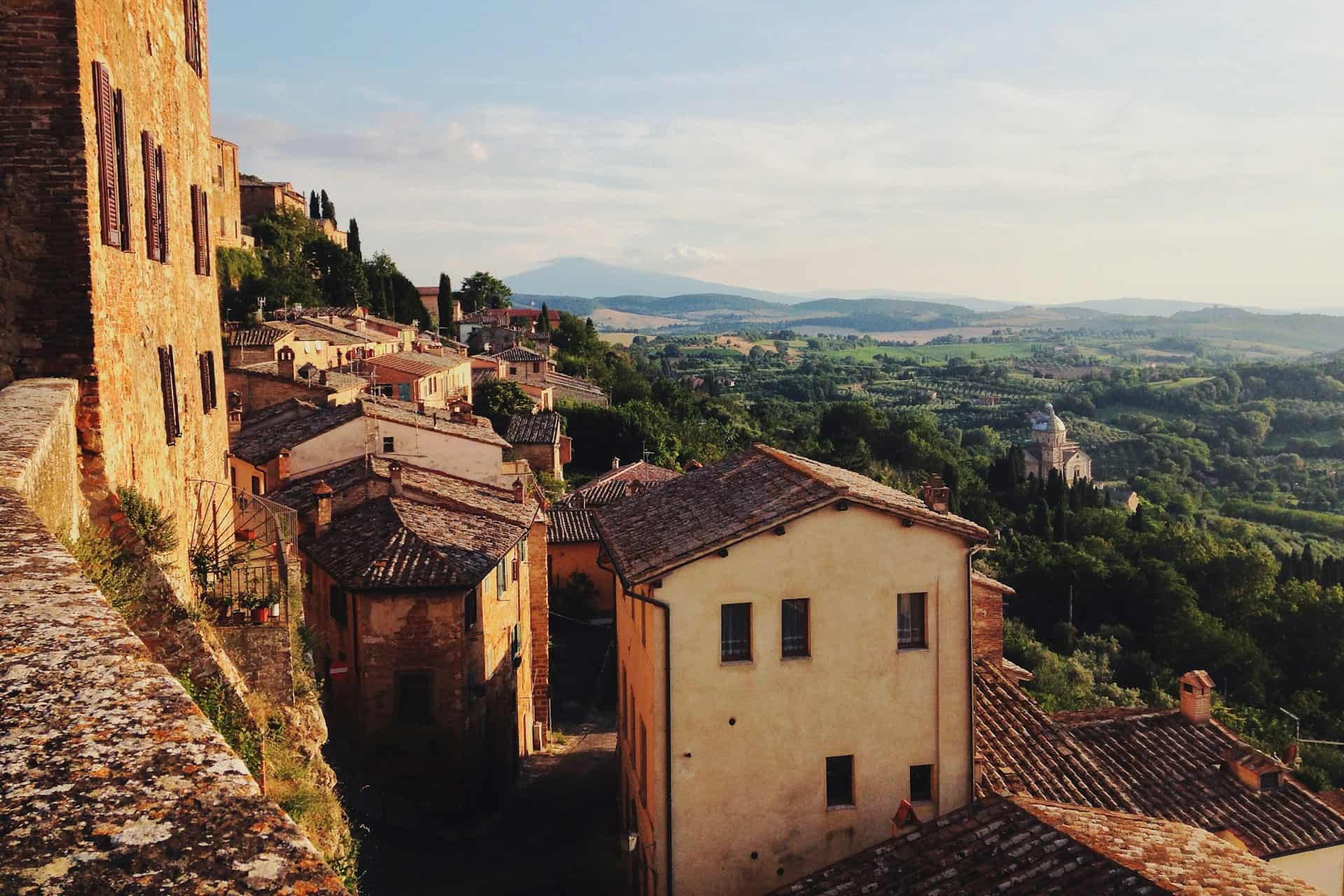 Brown houses on the hillside in Tuscany, Italy