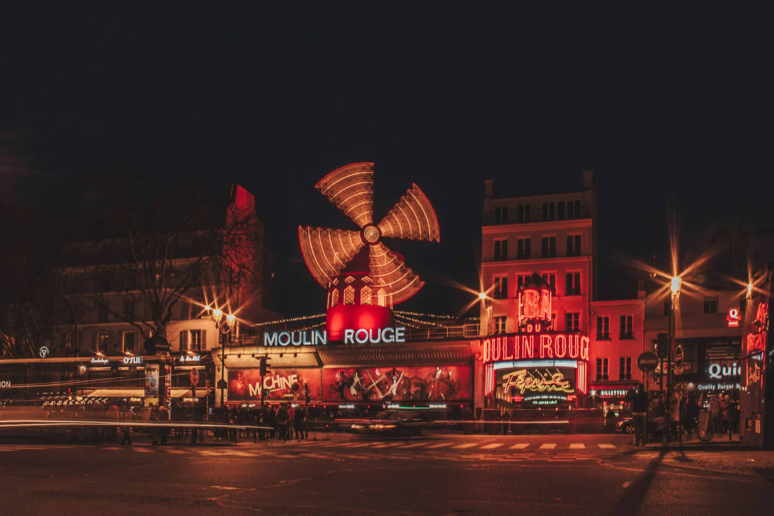 View of Moulin Rouge in Paris at night
